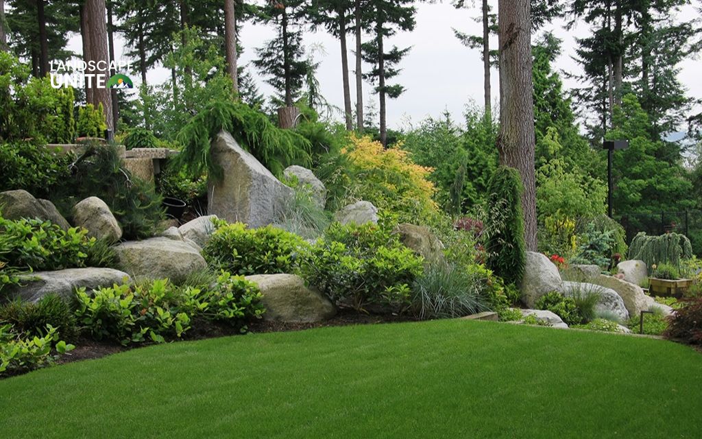 14 creative front yard artificial grass and rock landscaping ideas 4 Artificial grass with decorative boulders and lighting