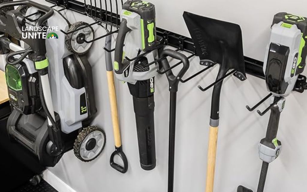 Use a wall-mounted mower hanger