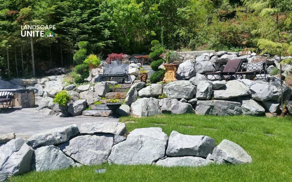 Flower bed on slope made easy: 15 low-maintenance ideas for hillside gardens 13 Boulder retention garden