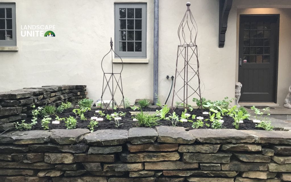 Raised rock flower beds: 14 ideas for low-maintenance beauty 3 Rustic fieldstone garden